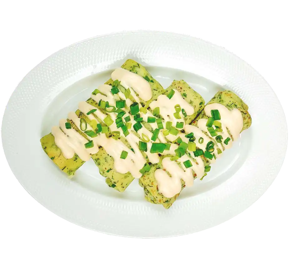 Млинці з куркою, грибами та сирним соусом